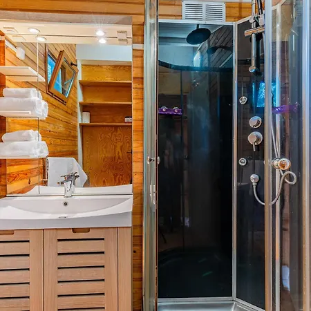 Апартаменты La Maisonnette En Bois Saumos